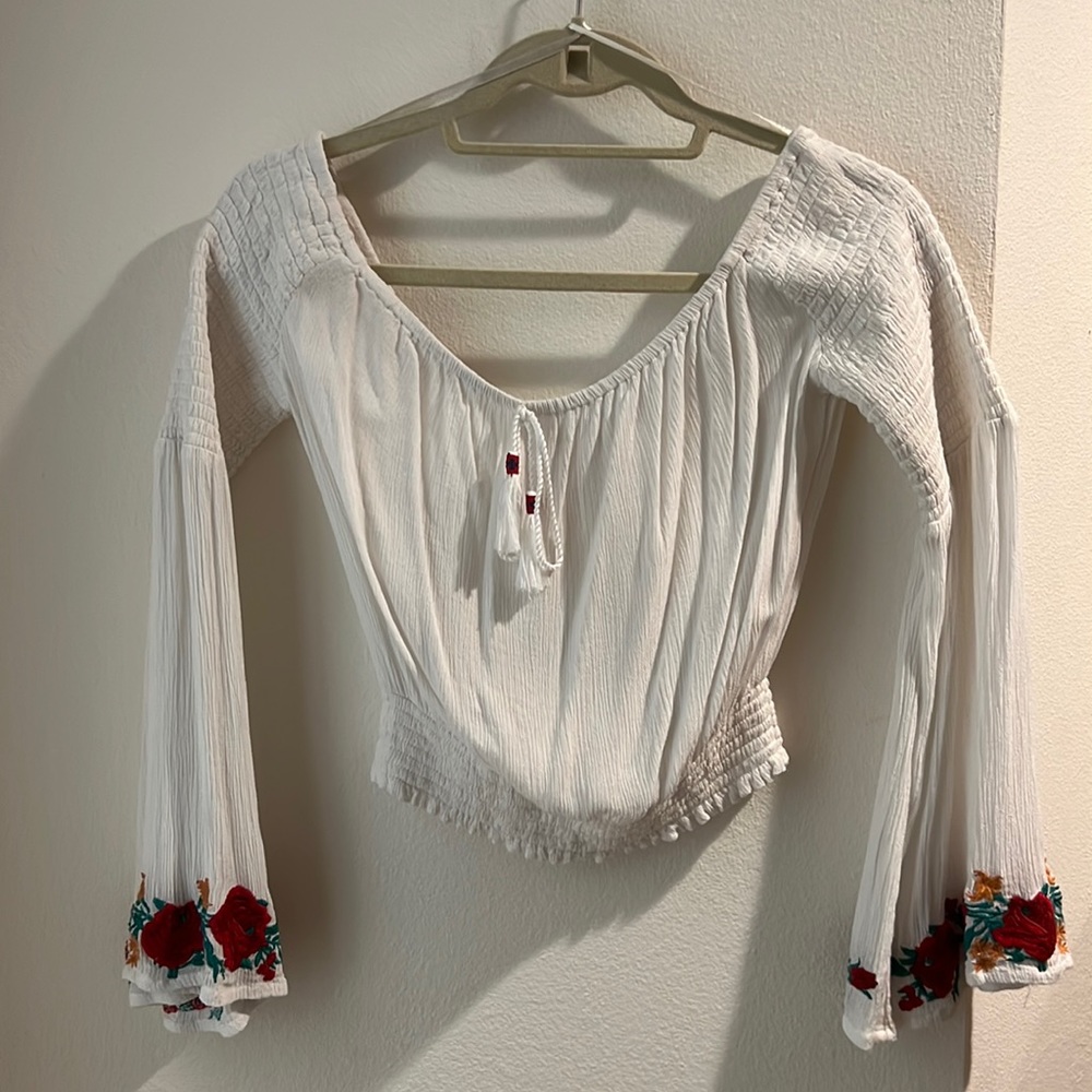 Super cute flowy white off the shoulder blouse